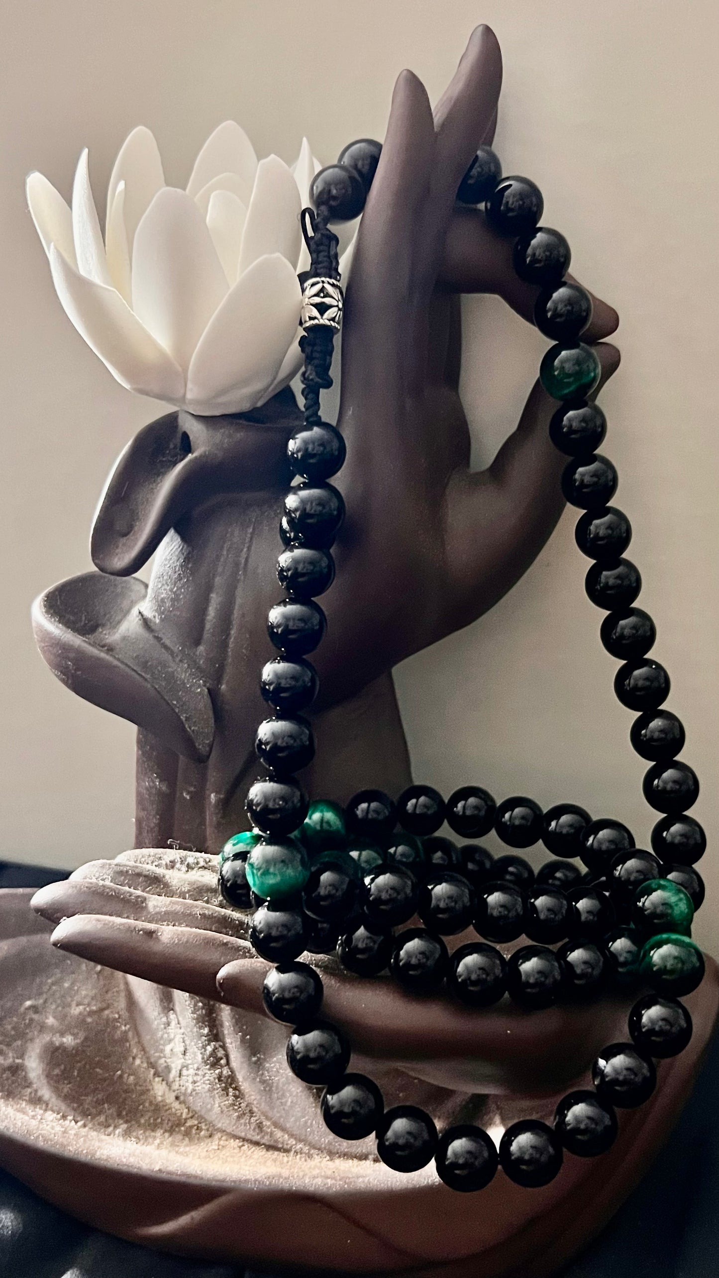 Onyx: increase regeneration, happiness, intuition, instincts ; Green Tiger Eye: sharpness to one's inner vision and better understanding of the cause and effect necklace (length 32”)