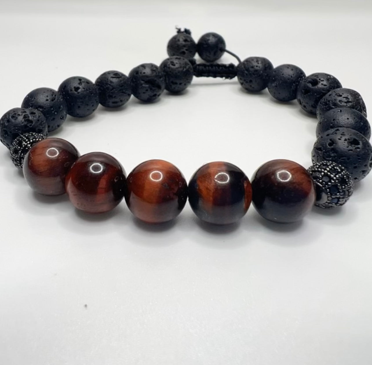 Red Tiger Eye focus the mind, promoting mental clarity, assisting us to resolve problems objectively and unclouded by emotions lava: strengthens one's connection to Mother Earth bracelet.2