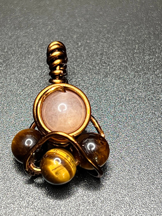 Tiger eye - promotes vitality and physical action / White Aventurine- helps spiritual growth,  Clears the mind, Strengthens the ability to communicate, Helps with self-reflection