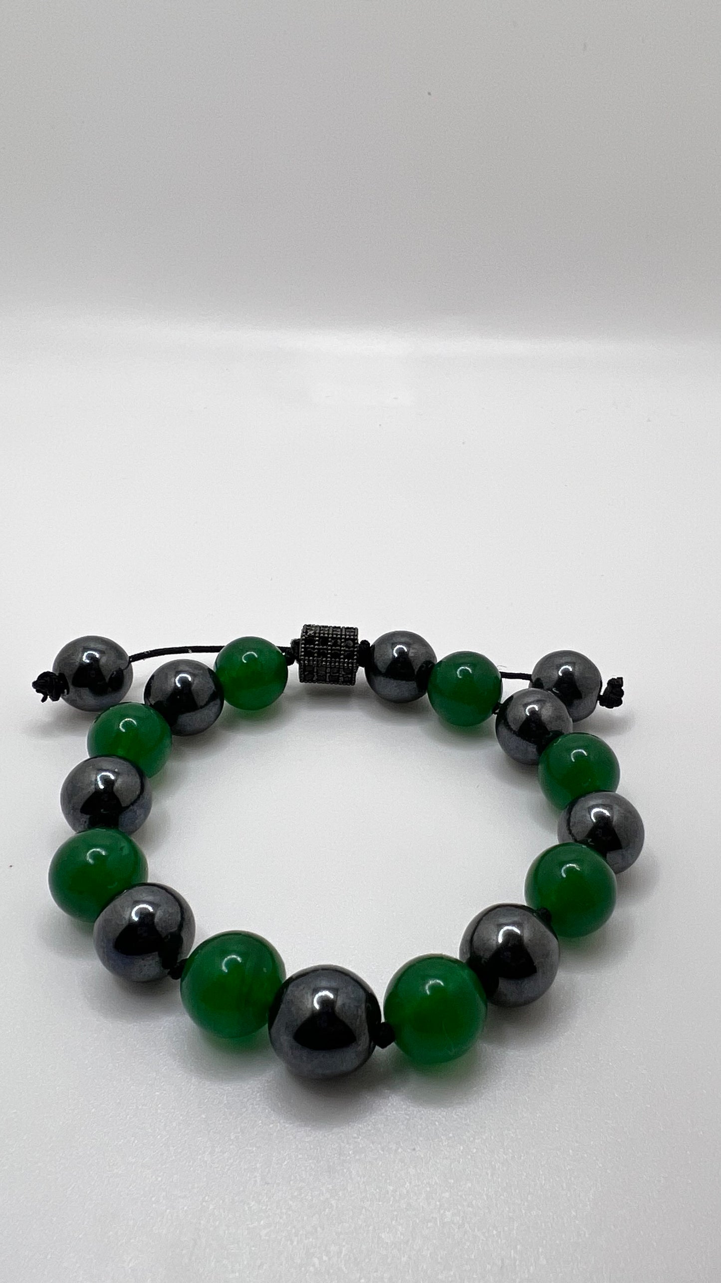 Jade has the ability to transform negative energies into positive ones that promote joyfulness and love/ Hematite used for protection and stability bracelet