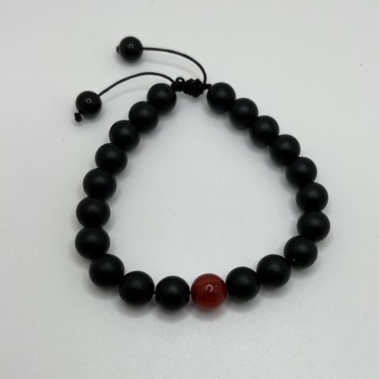 Carnelian:  restores vitality and motivation, and stimulates creativity Onyx: increase regeneration, happiness, intuition, instincts —bracelet size 8”