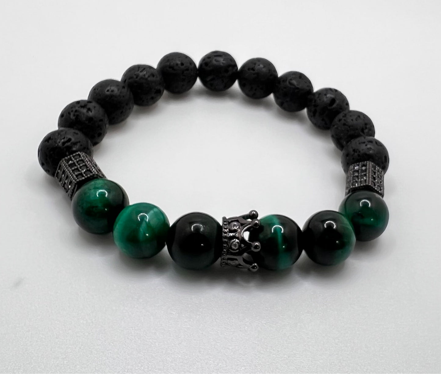 Green Tiger Eye: sharpness to one's inner vision and better understanding of the cause and effect / Lava: grounding and calming.stabilizes the root chakra, 16cm stretch bracelet