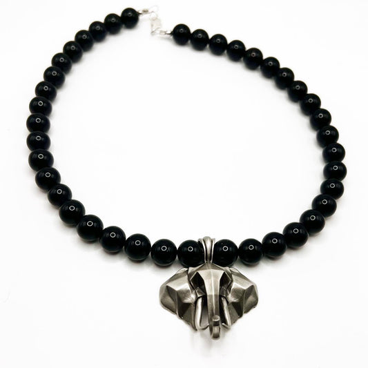 Onyx- increase regeneration, happiness, intuition, instincts necklace 16” with stainless steel elephant