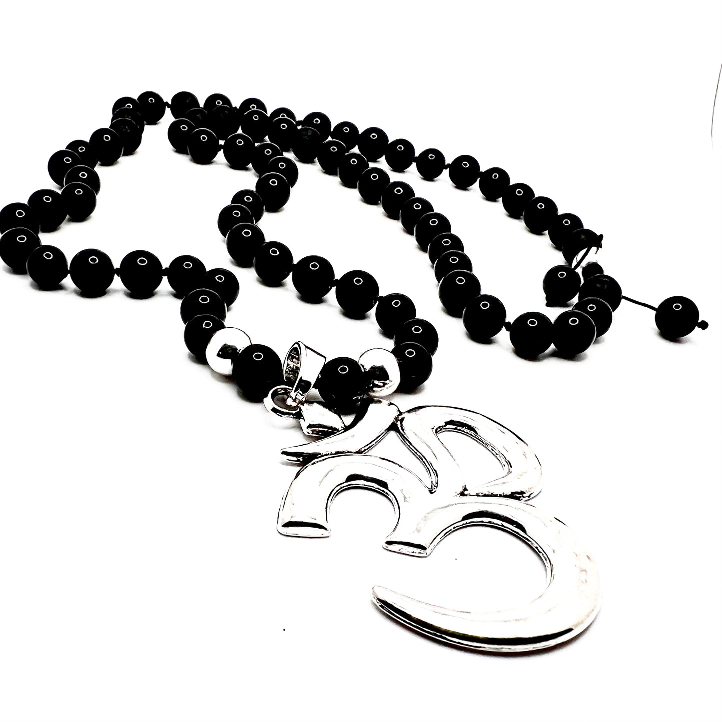 OM Pendant (.925 sterling silver pendant)with Onyx: increase regeneration, happiness, intuition, instincts /Lava:grounding and calming. stabilizes the root chakra— Necklace (lenth 32”)