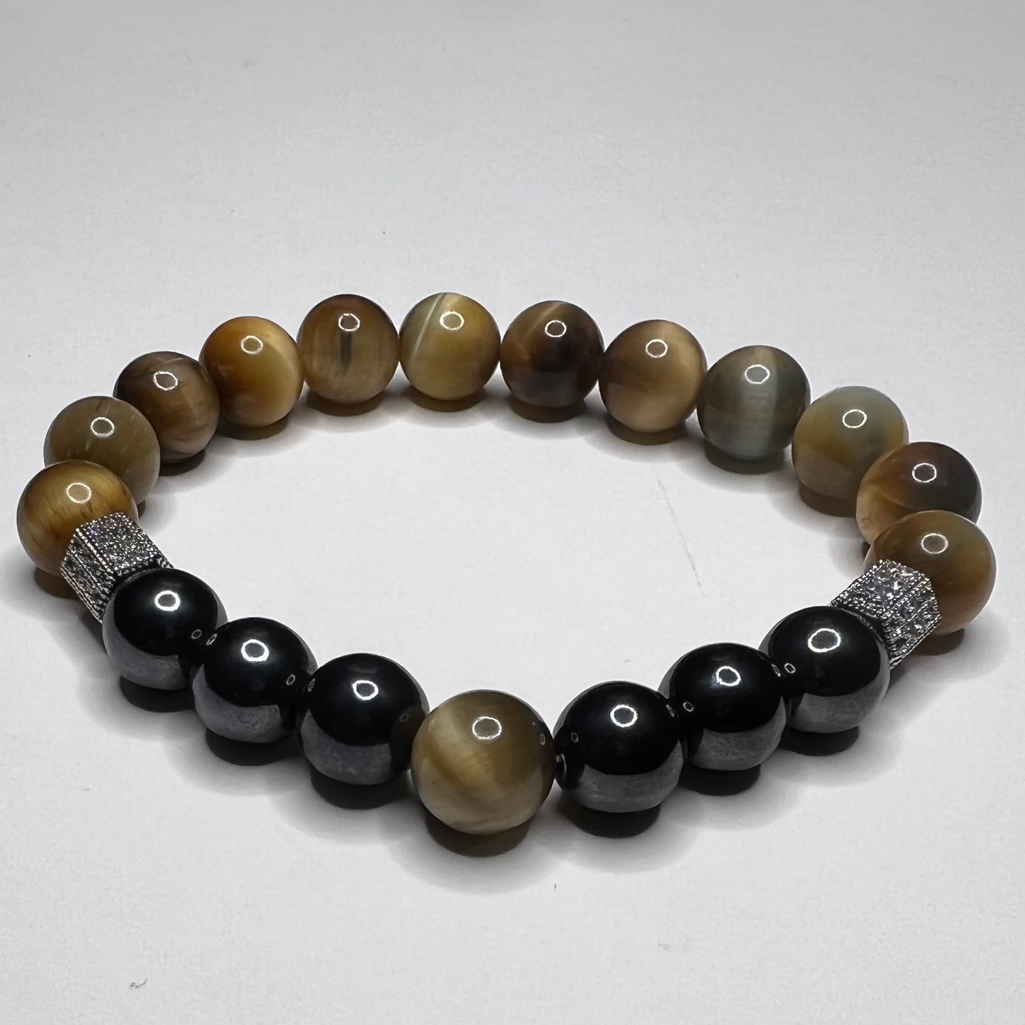 Tiger Eye-(promotes vitality and physical action ) Hematite—(restores, strengthens and regulates blood supply. Great for anxiety) bracelet