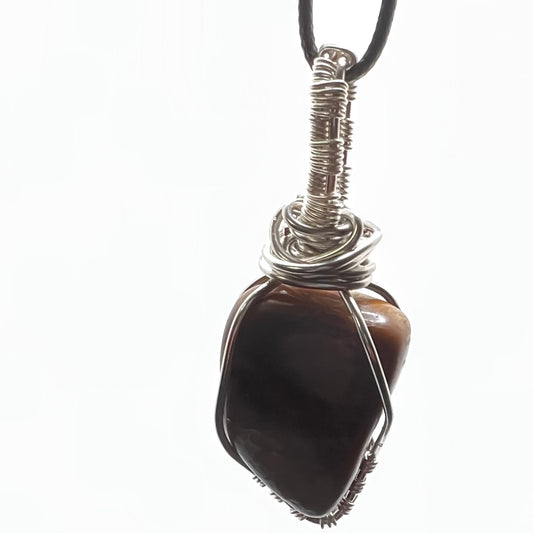 Tiger Eye- Pendant- promotes vitality and physical action