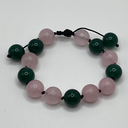 Rose Quartz: unconditional love! It's said to boost feelings of self-love and foster loving relationships with others/ Green Agate: deeply protective stone.  Protects from negative energy